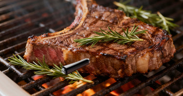 Wireless Grill Thermometer in Steak on the Grate
